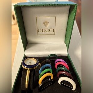 Authentic Vintage Gucci
with 12 colored bezels